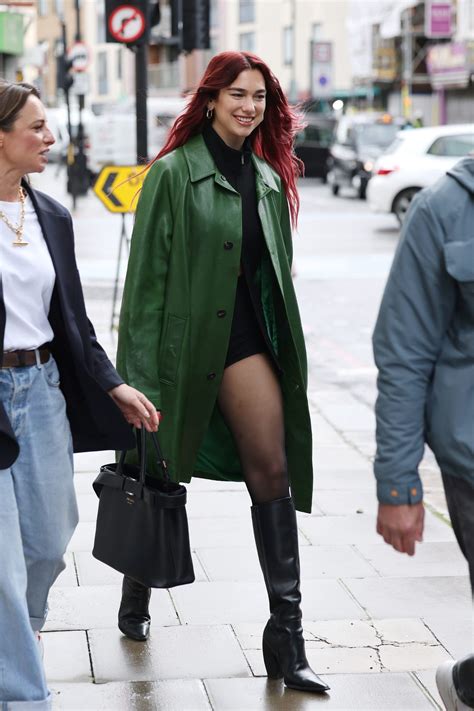 dua lipa green jacket|Dua Lipa Masters the Pantsless Trend for a Rainy Day in .